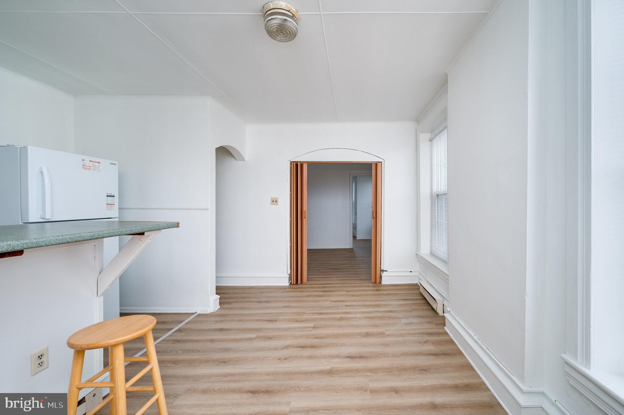 302-4 West Main Street Kutztown, PA 19530 - Photo 14 of 37 a view of a hallway with wooden floor and closet