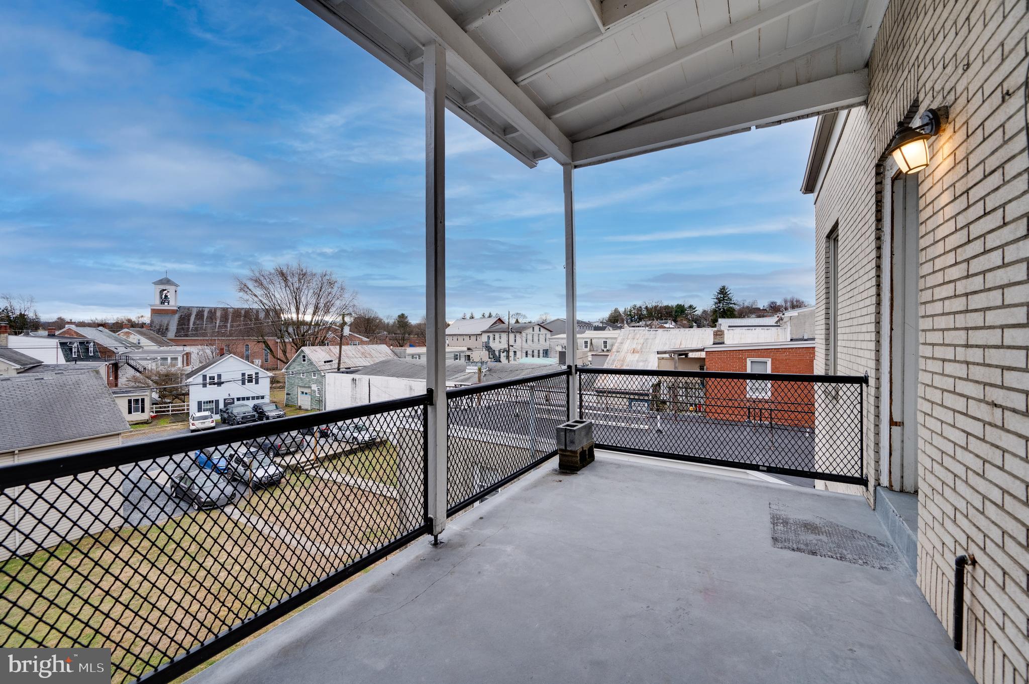 302-4 West Main Street Kutztown, PA 19530 - Photo 23 of 37 a city view from a balcony