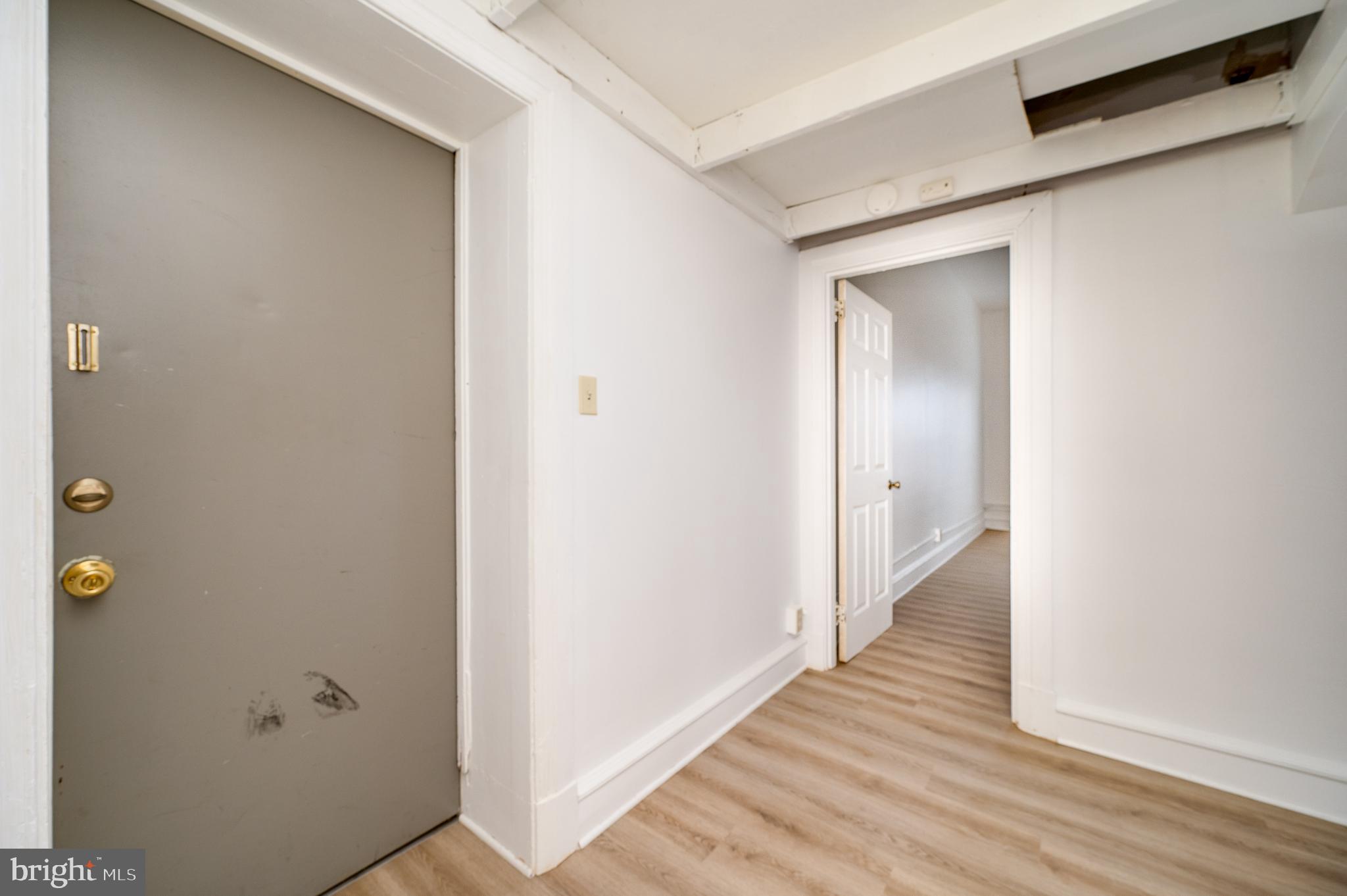 302-4 West Main Street Kutztown, PA 19530 - Photo 7 of 37 a view of a hallway with wooden floor