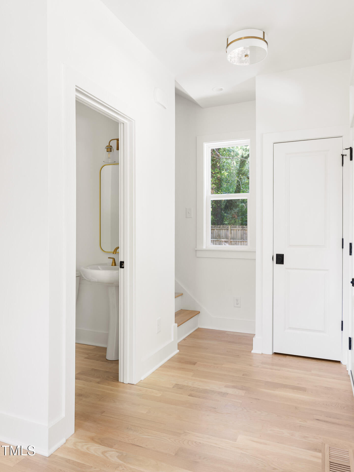407 B Edward Street Durham, NC 27701 - Photo 18 of 39 a view of a room that has a window in it