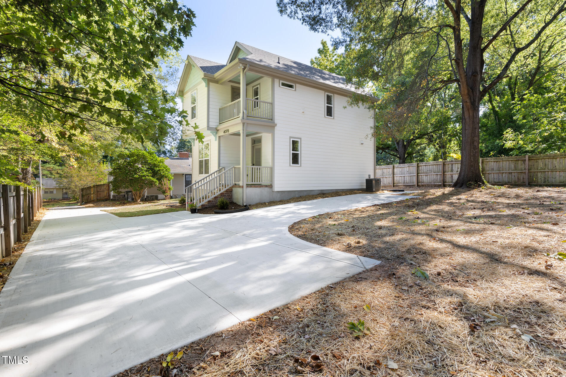 407 B Edward Street Durham, NC 27701 - Photo 4 of 39 a view of a white house with a outdoor space