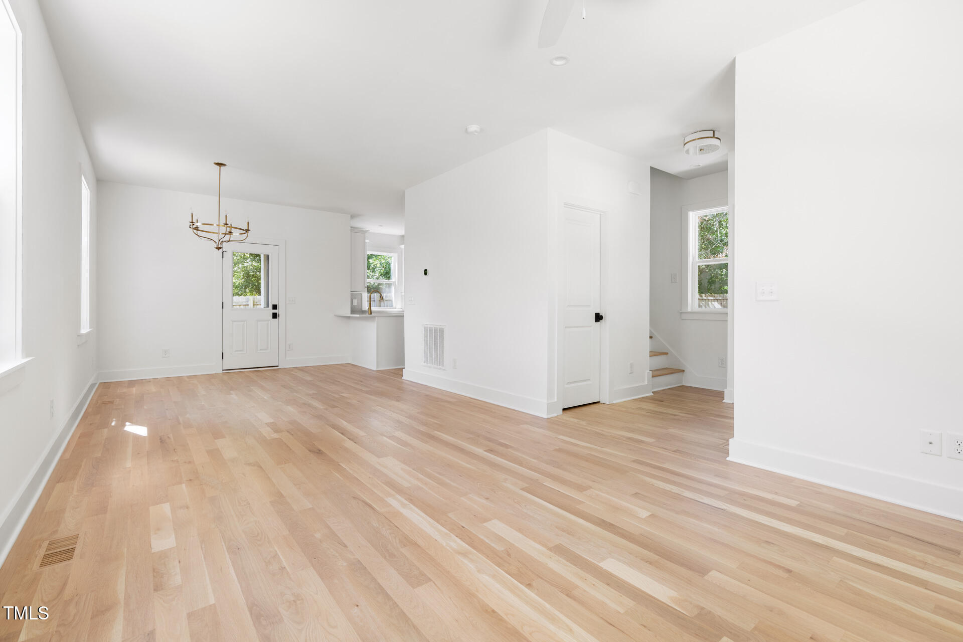 407 B Edward Street Durham, NC 27701 - Photo 8 of 39 a view of empty room with wooden floor
