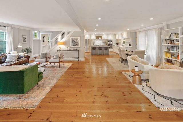 a lobby with furniture and a table