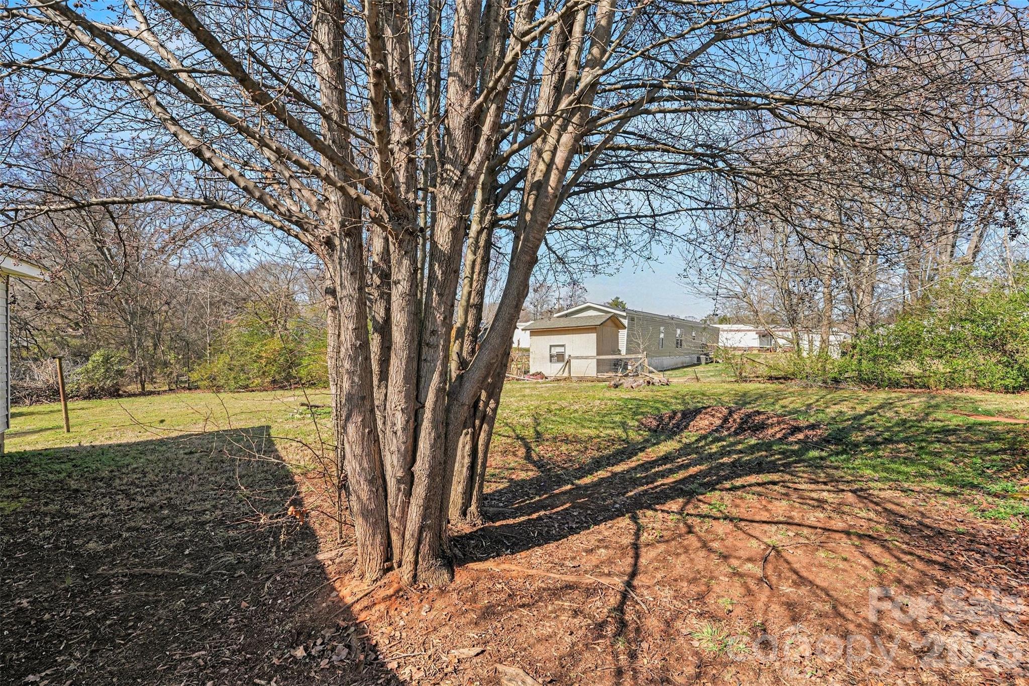 1440 Majolica Road Salisbury, NC 28147 - Photo 21 of 25 a view of a yard with wooden fence