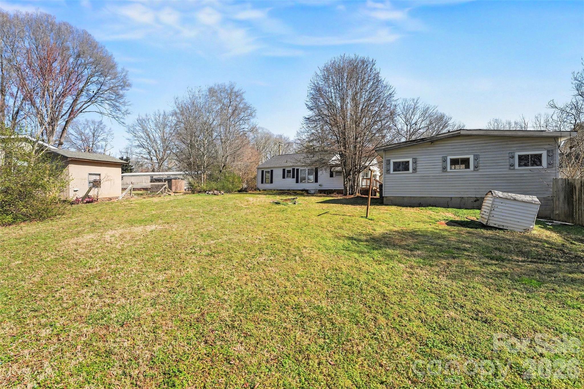 1440 Majolica Road Salisbury, NC 28147 - Photo 22 of 25 a view of a house with a yard covered with snow