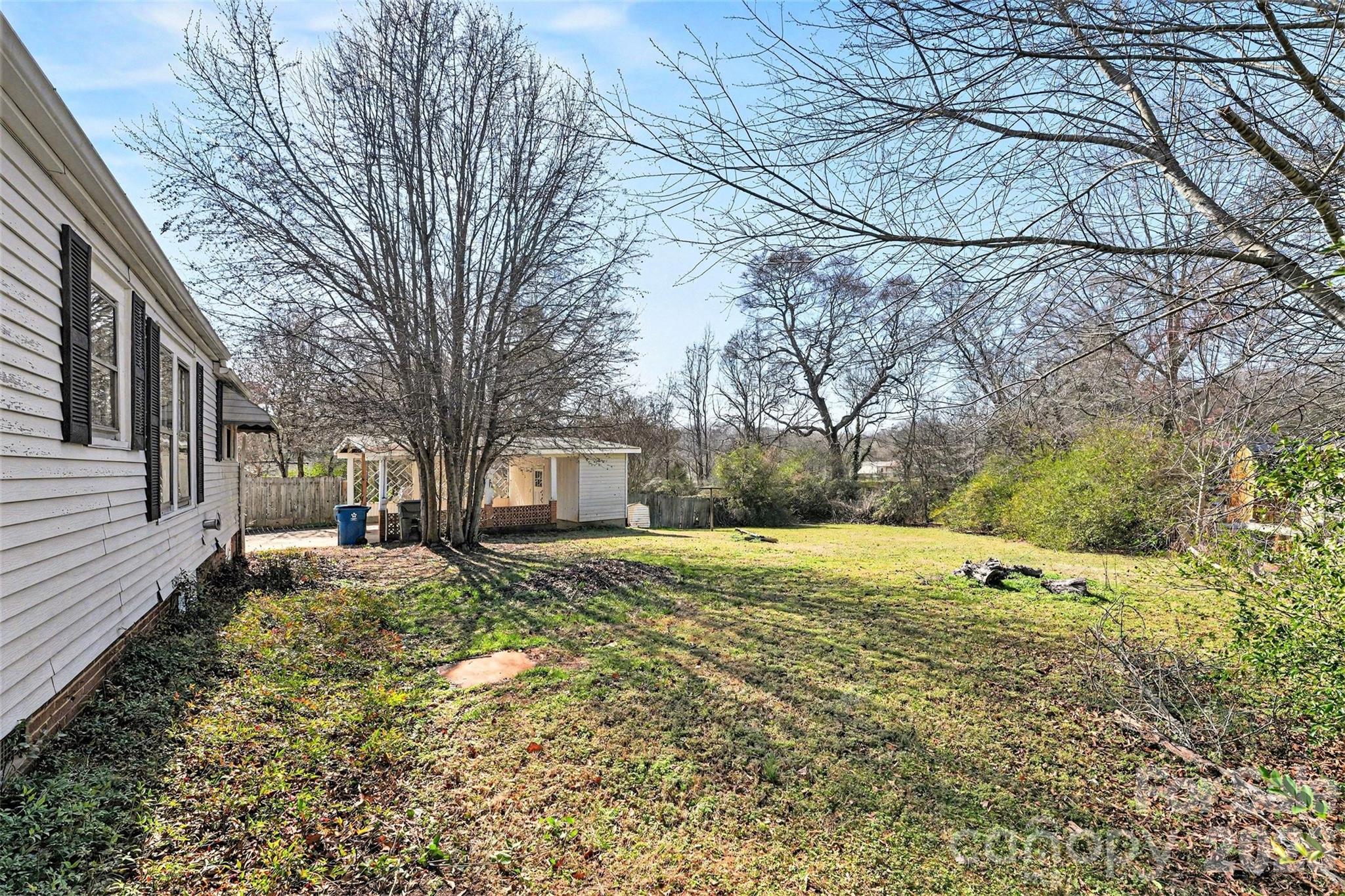 1440 Majolica Road Salisbury, NC 28147 - Photo 24 of 25 a view of a yard with large trees