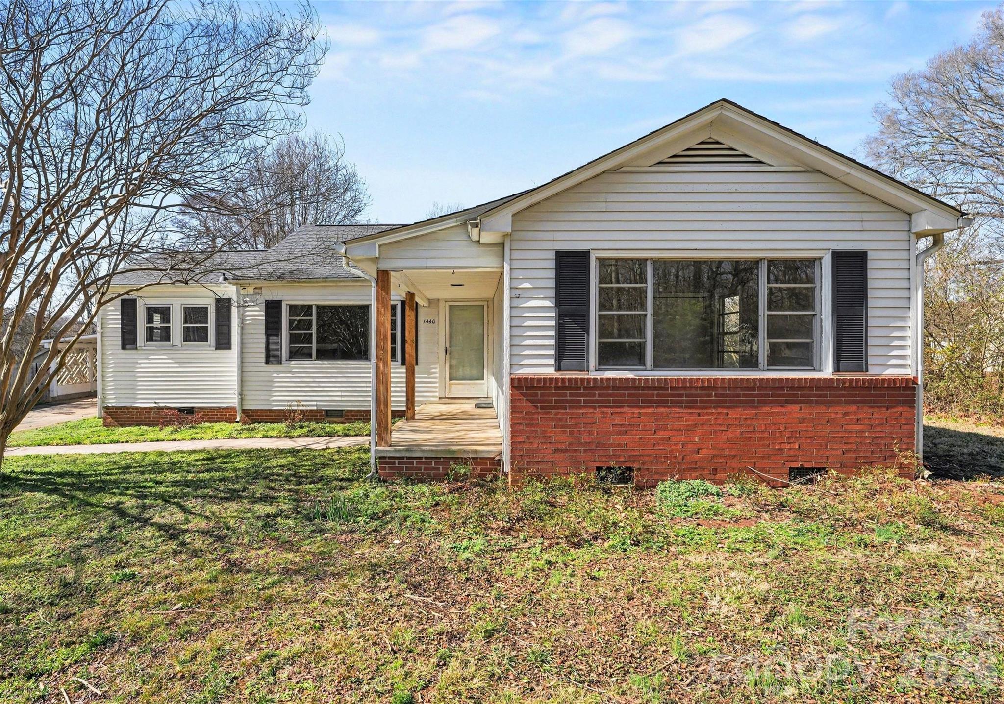 1440 Majolica Road Salisbury, NC 28147 - Photo 7 of 25 a front view of a house with a garden