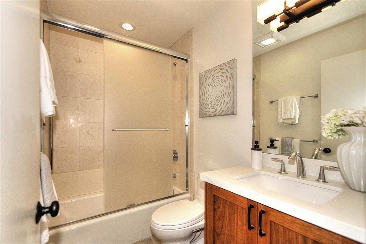 73 Pearce Mitchell Place Stanford, CA 94305 - Photo 11 of 17 a bathroom with a sink a toilet and shower