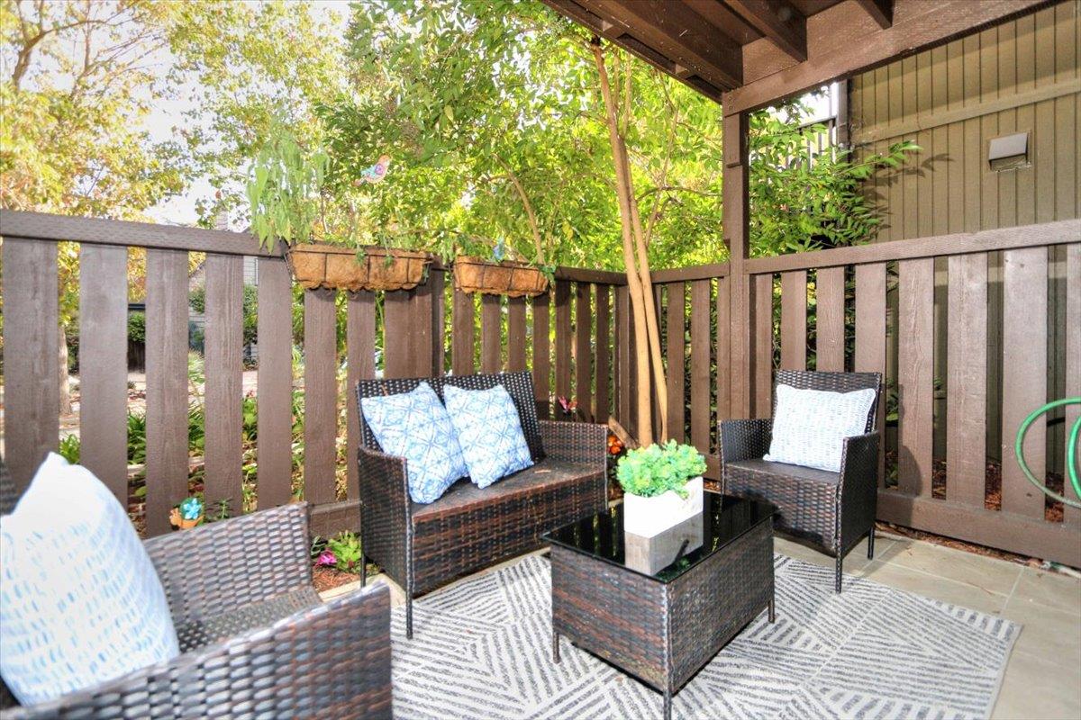 73 Pearce Mitchell Place Stanford, CA 94305 - Photo 14 of 17 a outdoor living room with furniture and a wooden floor