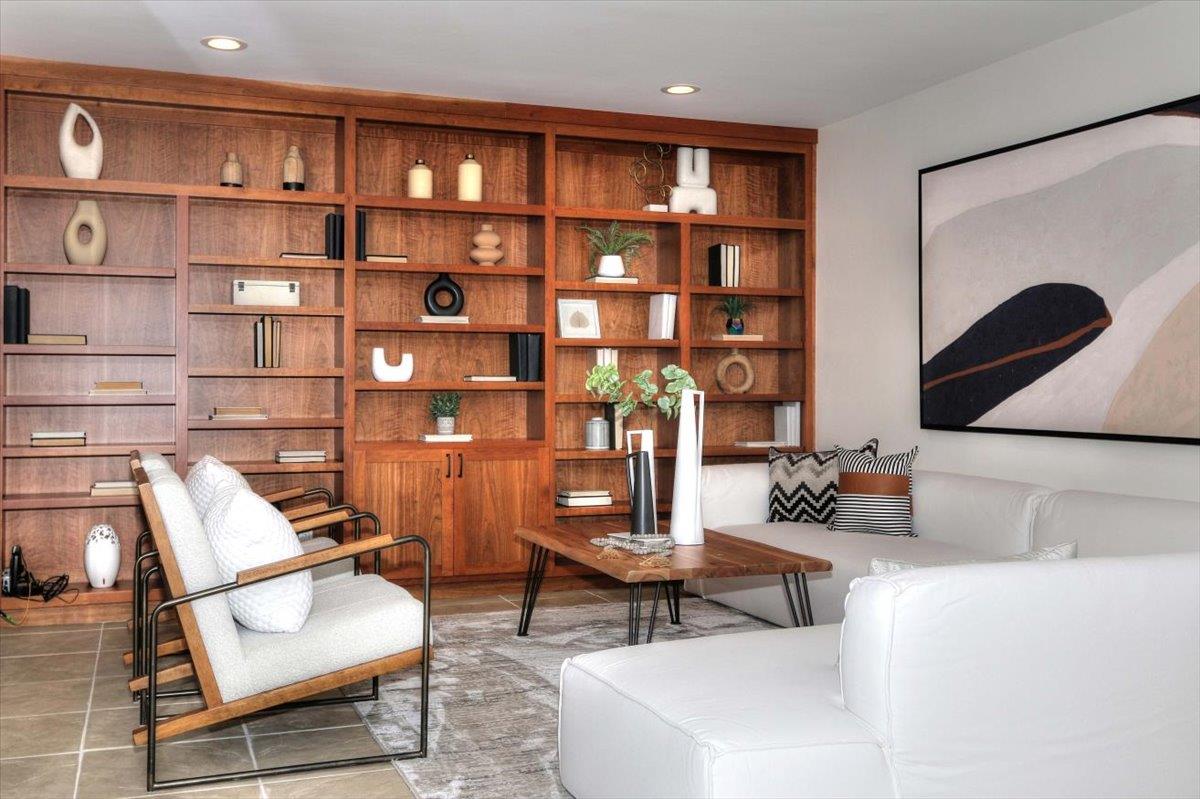 73 Pearce Mitchell Place Stanford, CA 94305 - Photo 4 of 17 a living room with furniture and a book shelf