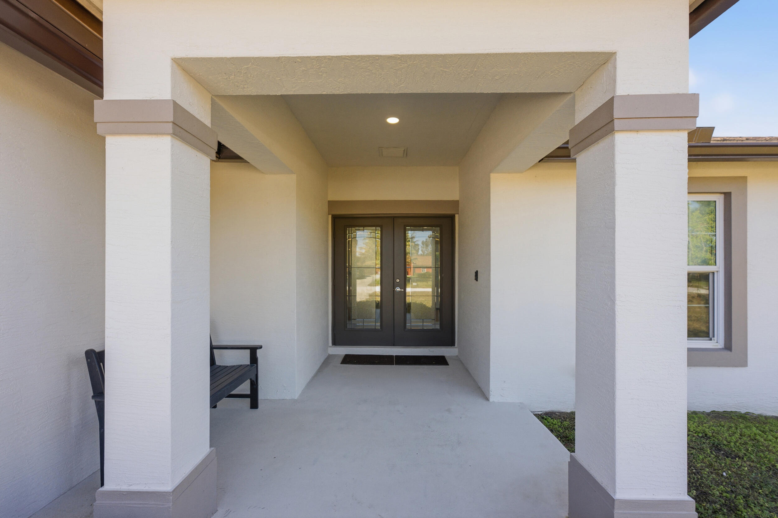 18932 42nd Road North The Acreage, FL 33470 - Photo 12 of 45 a view of a hallway with a room and a entryway