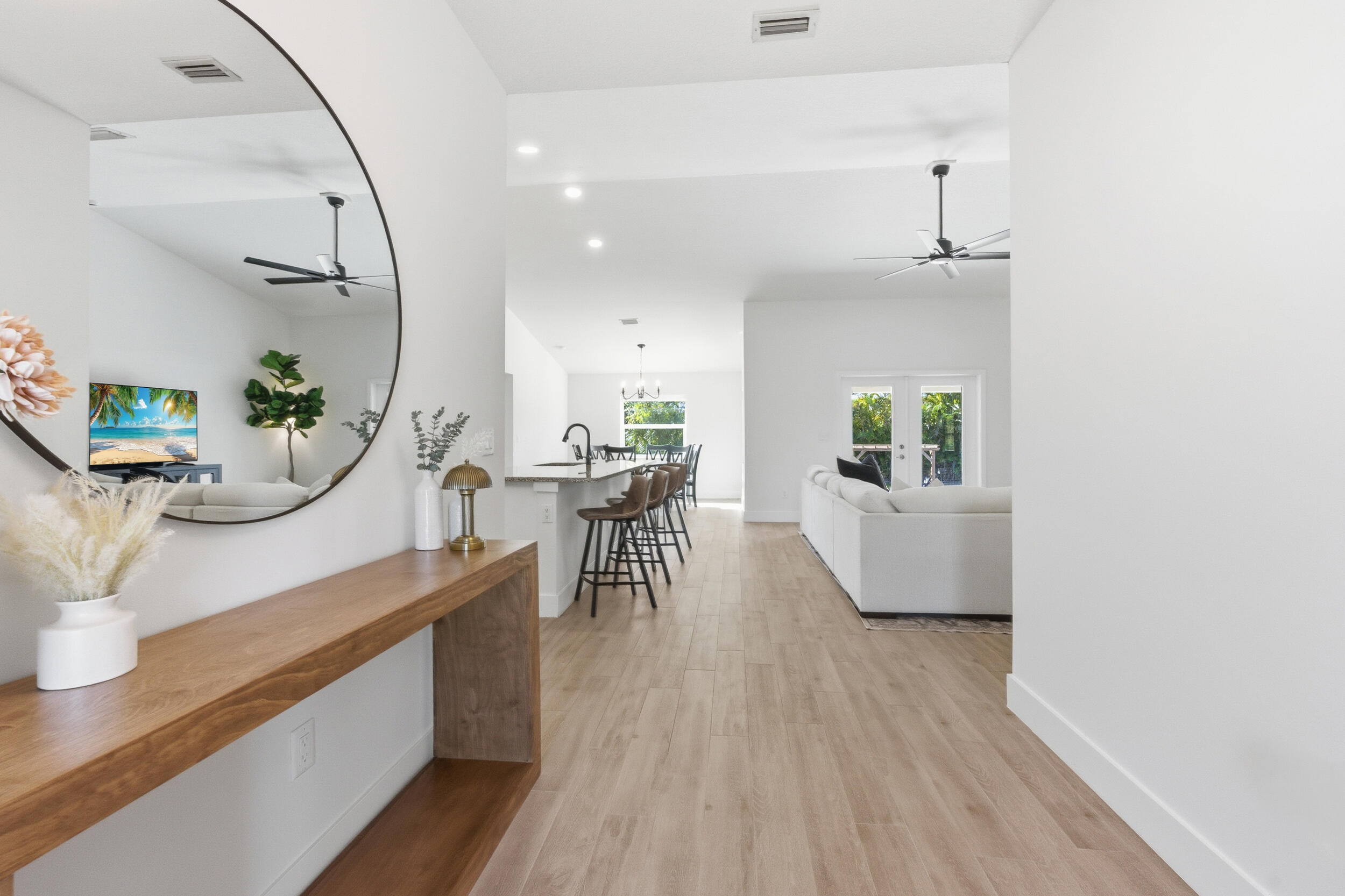 18932 42nd Road North The Acreage, FL 33470 - Photo 14 of 45 a living room with furniture and a wooden floor