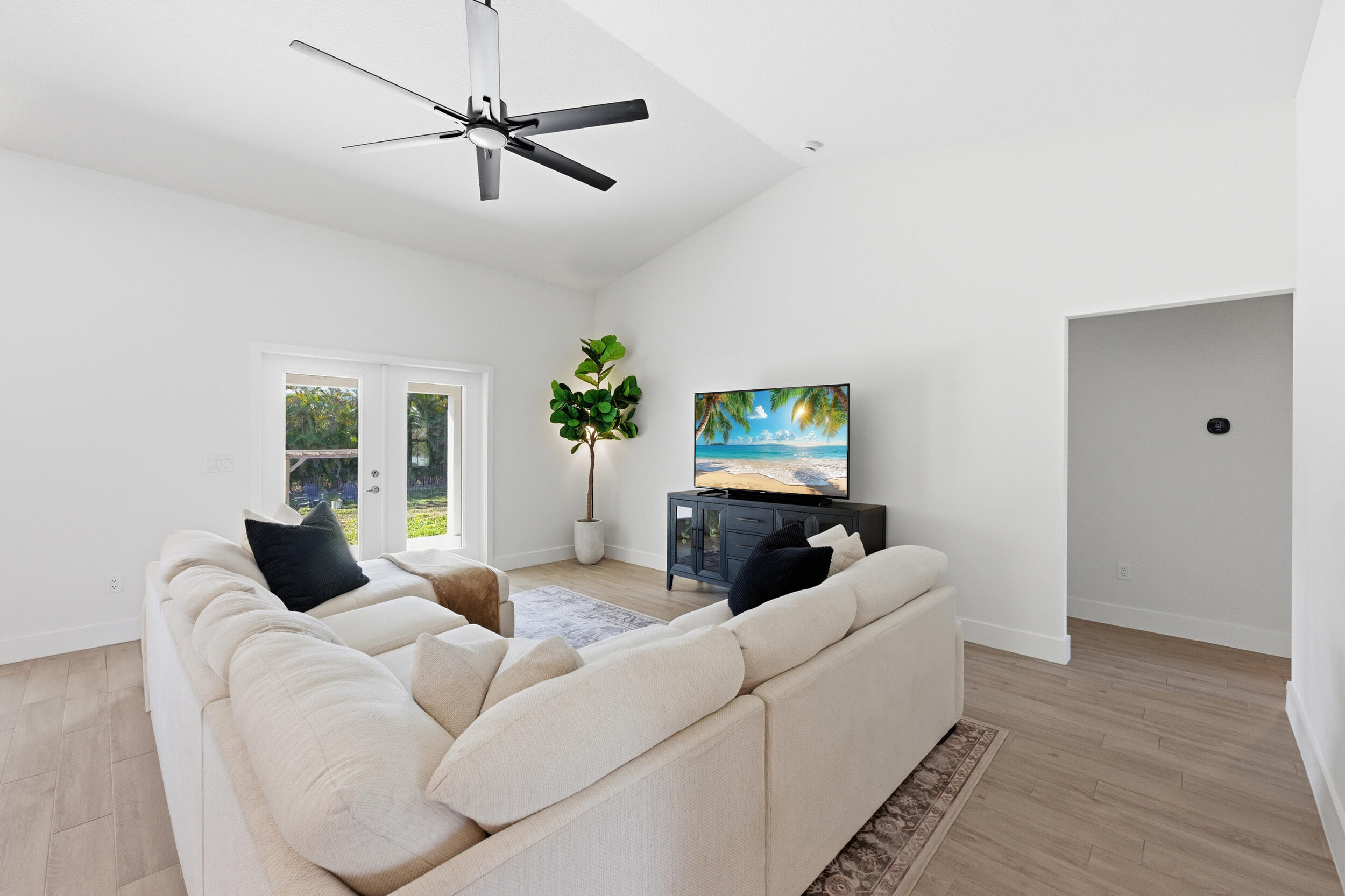 18932 42nd Road North The Acreage, FL 33470 - Photo 15 of 45 a living room with furniture and a wooden floor