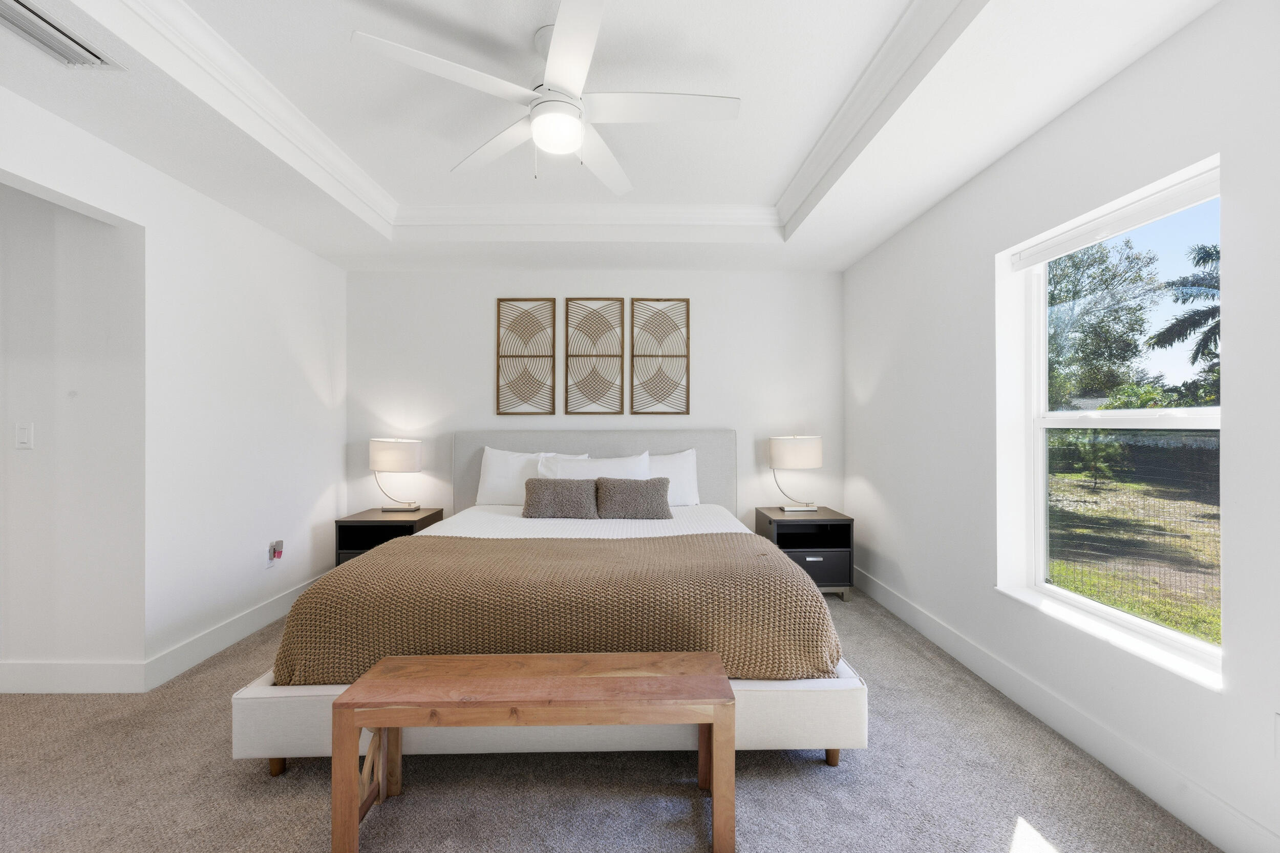 18932 42nd Road North The Acreage, FL 33470 - Photo 24 of 45 a bedroom with a bed and a window