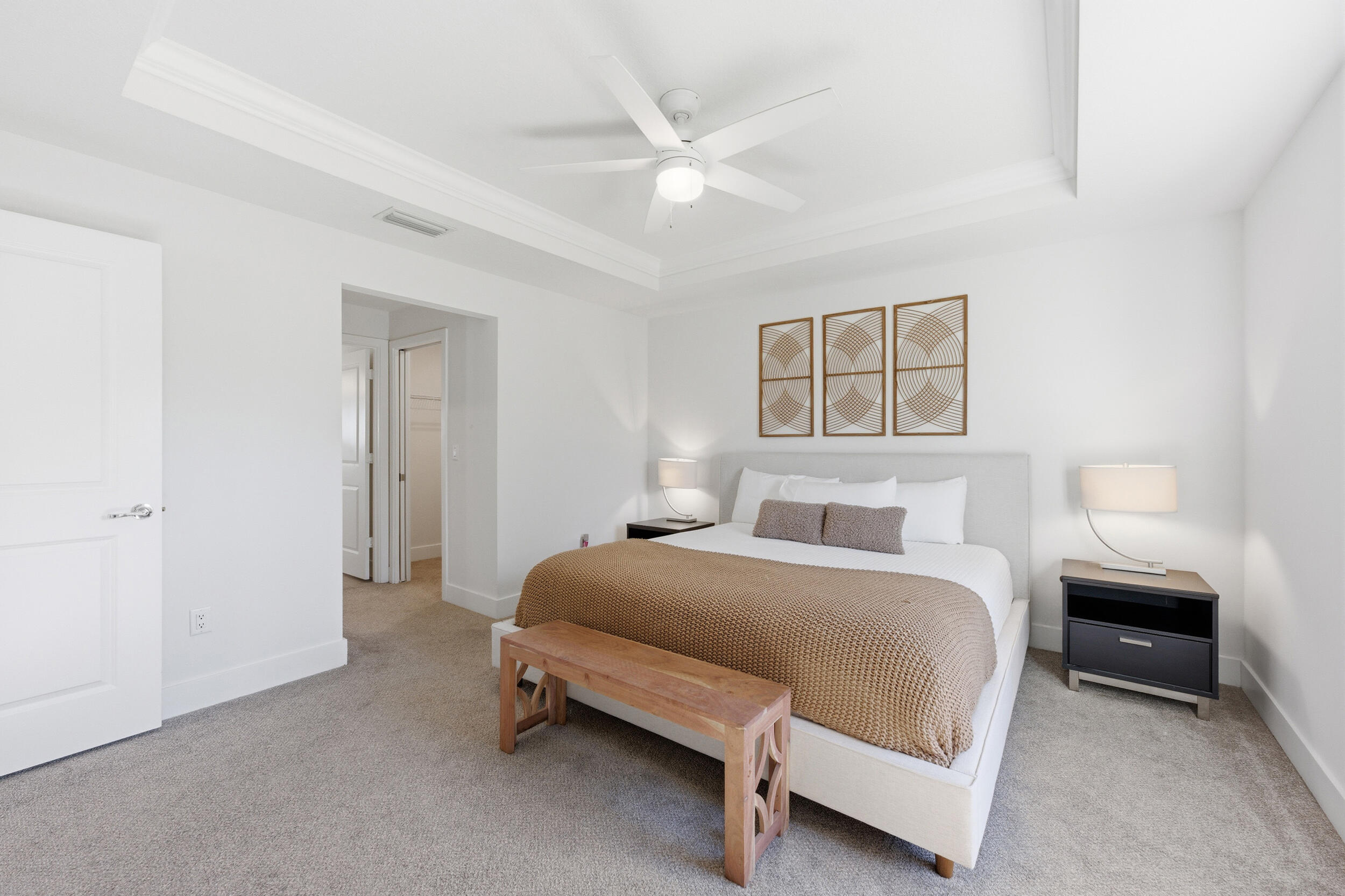 18932 42nd Road North The Acreage, FL 33470 - Photo 25 of 45 a bedroom with a bed and a ceiling fan