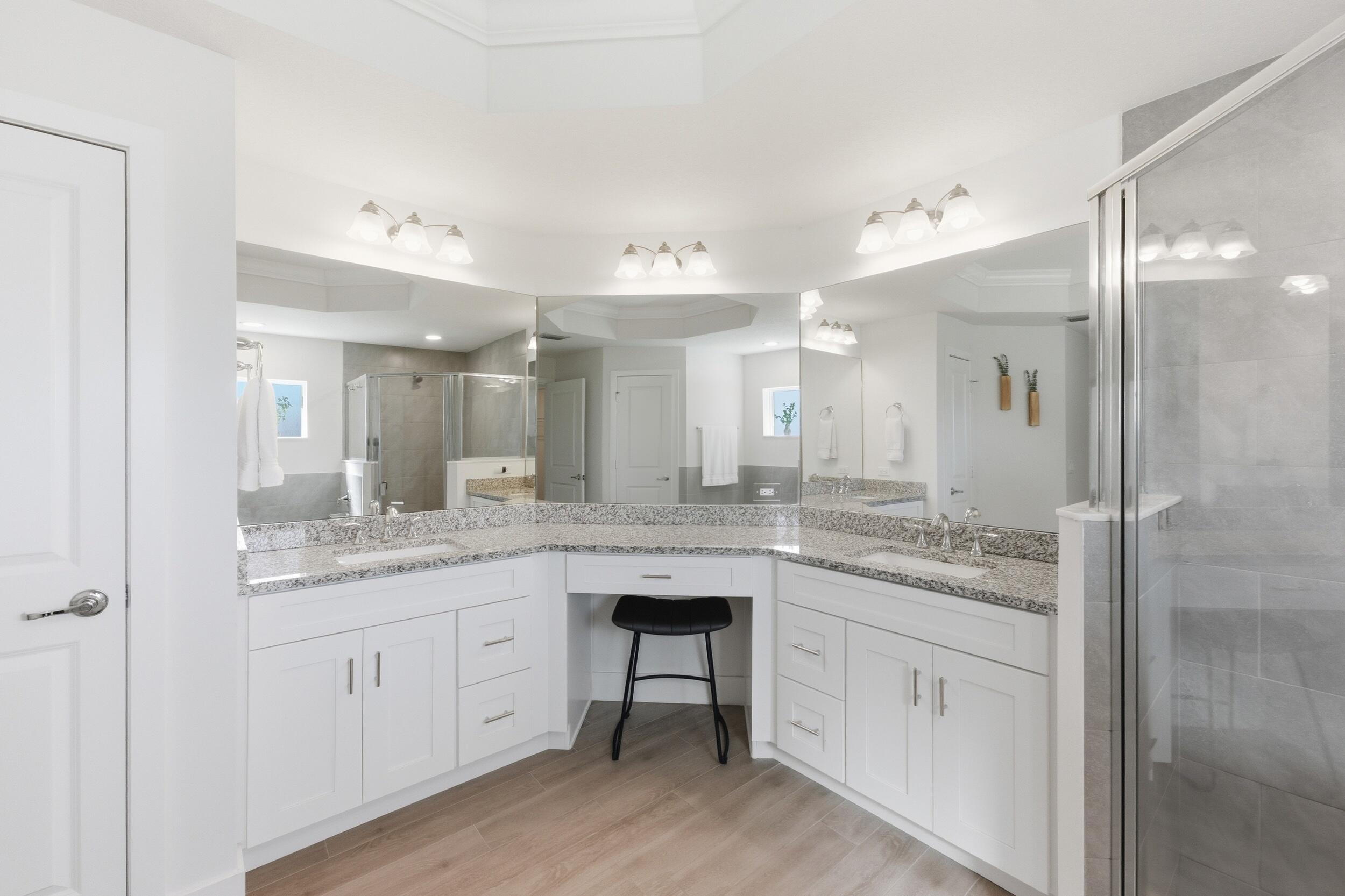 18932 42nd Road North The Acreage, FL 33470 - Photo 28 of 45 a bathroom with a granite countertop sink and a mirror