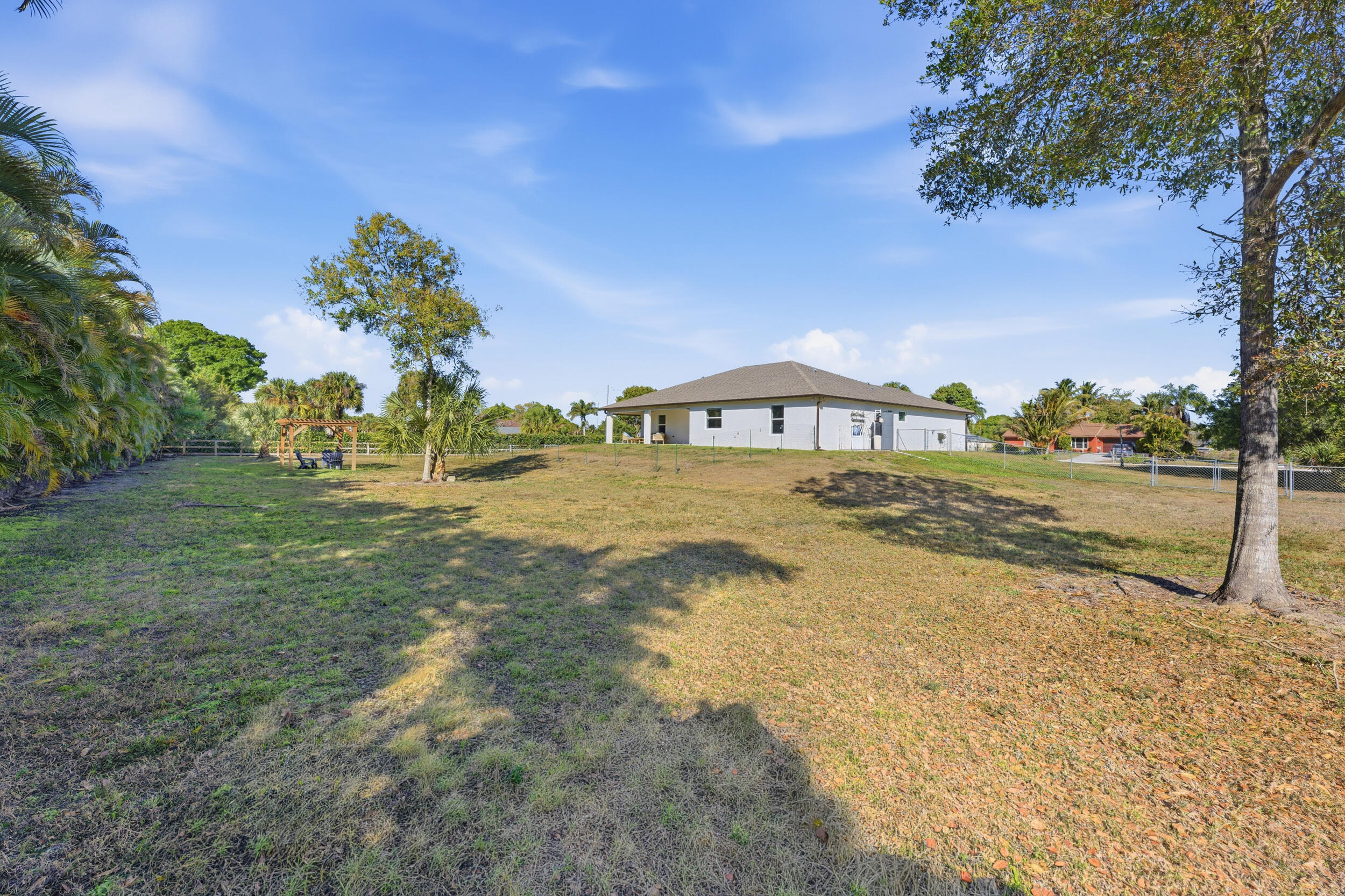 18932 42nd Road North The Acreage, FL 33470 - Photo 39 of 45 a view of an outdoor space and yard