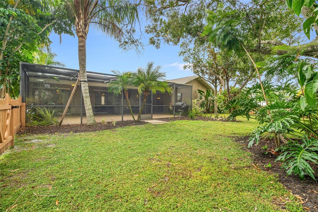 4207 Charing Cross Road Sarasota, FL 34241 - Photo 34 of 36 front view of a house with a yard