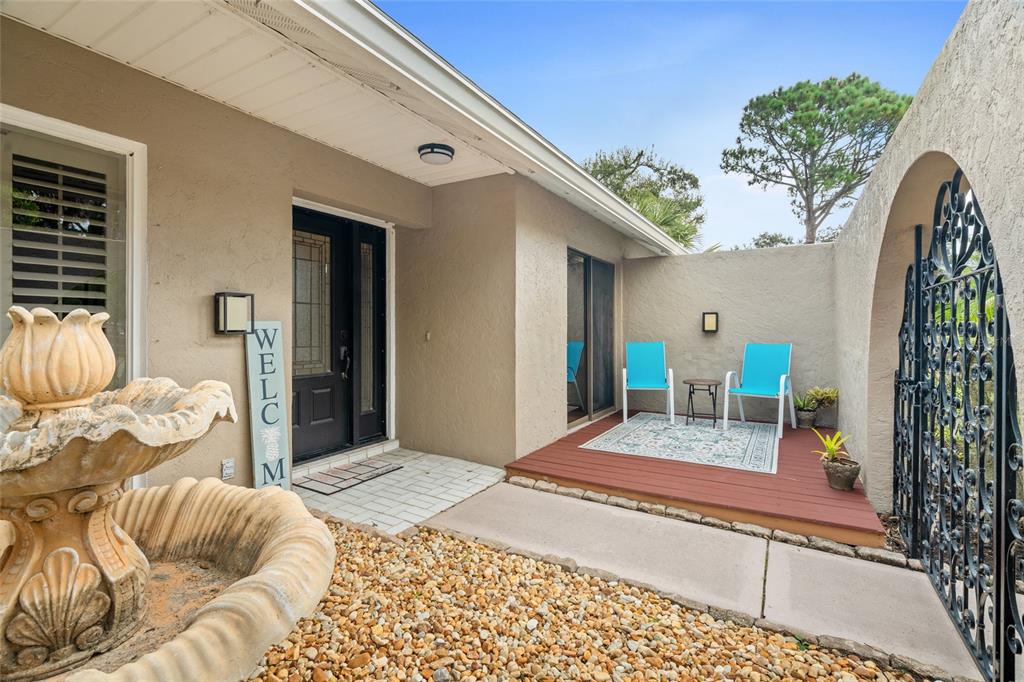 4207 Charing Cross Road Sarasota, FL 34241 - Photo 4 of 36 a bedroom with furniture and a wooden floor