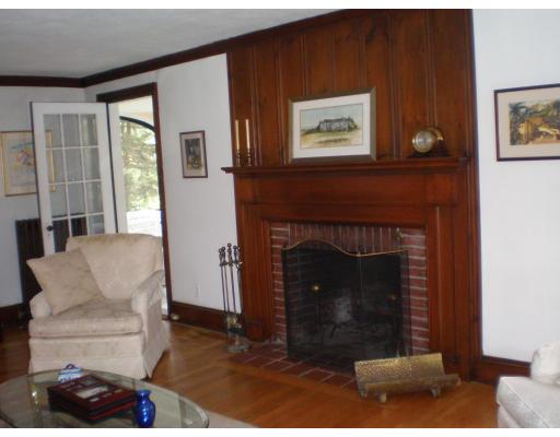 14 Kewadin Road Newton, MA 02468 - Photo 3 of 10 a living room with furniture a window and a fireplace