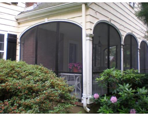 14 Kewadin Road Newton, MA 02468 - Photo 9 of 10 a view of a brick house with potted plants