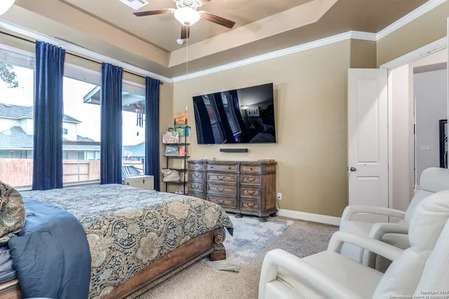 a spacious bathroom with a tub sink and mirror