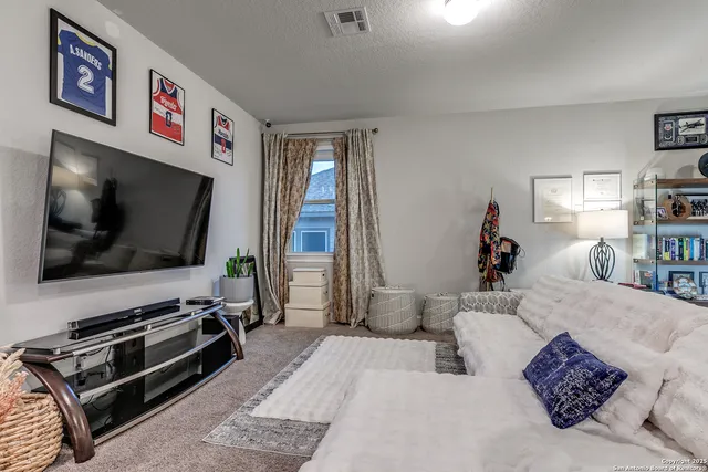 a swimming pool with yard and outdoor seating