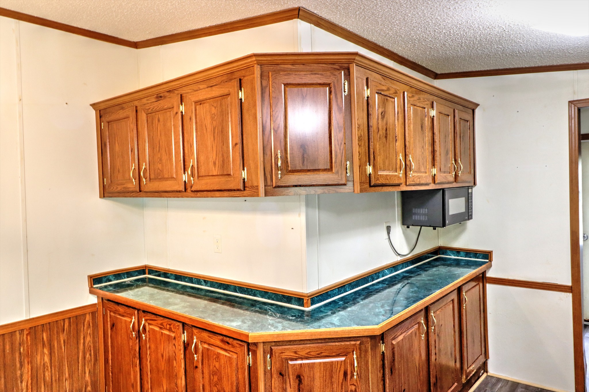 5090 Old Marion Road Cunningham, TN 37052 - Photo 11 of 21 a kitchen with stainless steel appliances granite countertop a sink a stove cabinets and a refrigerator