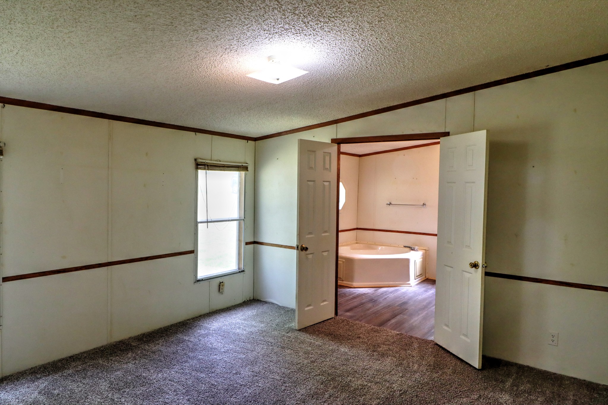 5090 Old Marion Road Cunningham, TN 37052 - Photo 12 of 21 a view of empty room with wooden floor
