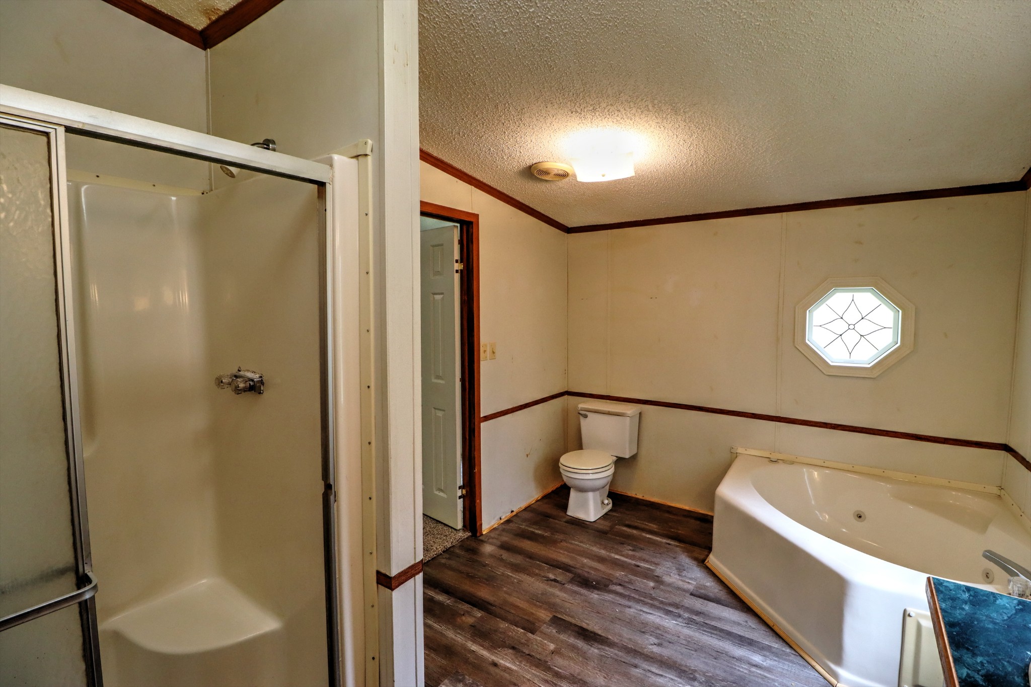 5090 Old Marion Road Cunningham, TN 37052 - Photo 13 of 21 a bathroom with a bathtub and a shower
