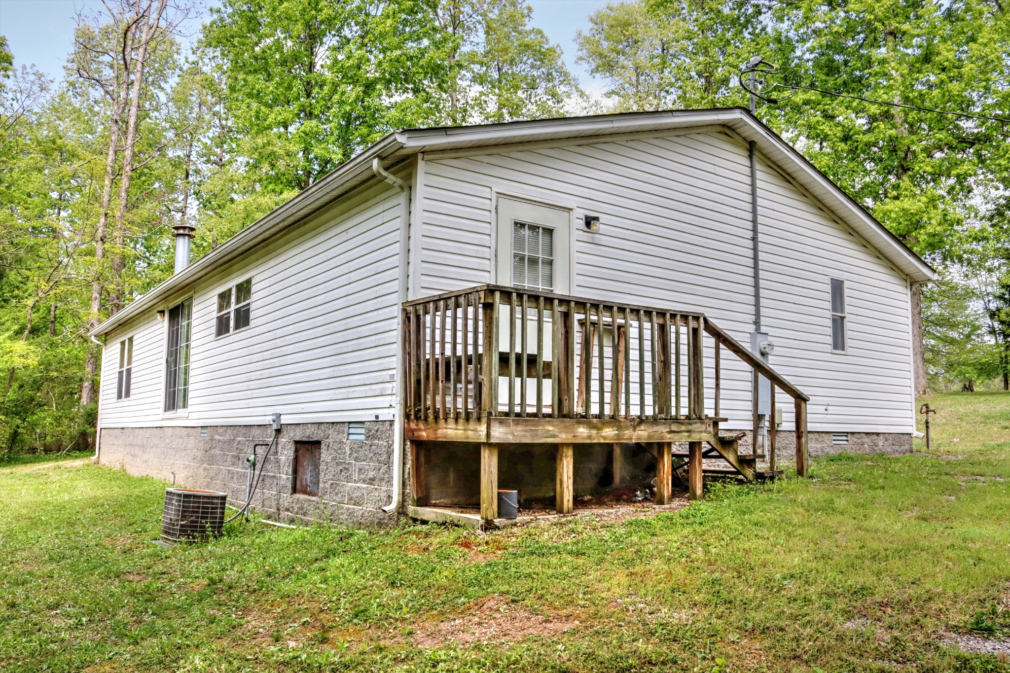 5090 Old Marion Road Cunningham, TN 37052 - Photo 3 of 21 a view of a house with a yard and sitting area