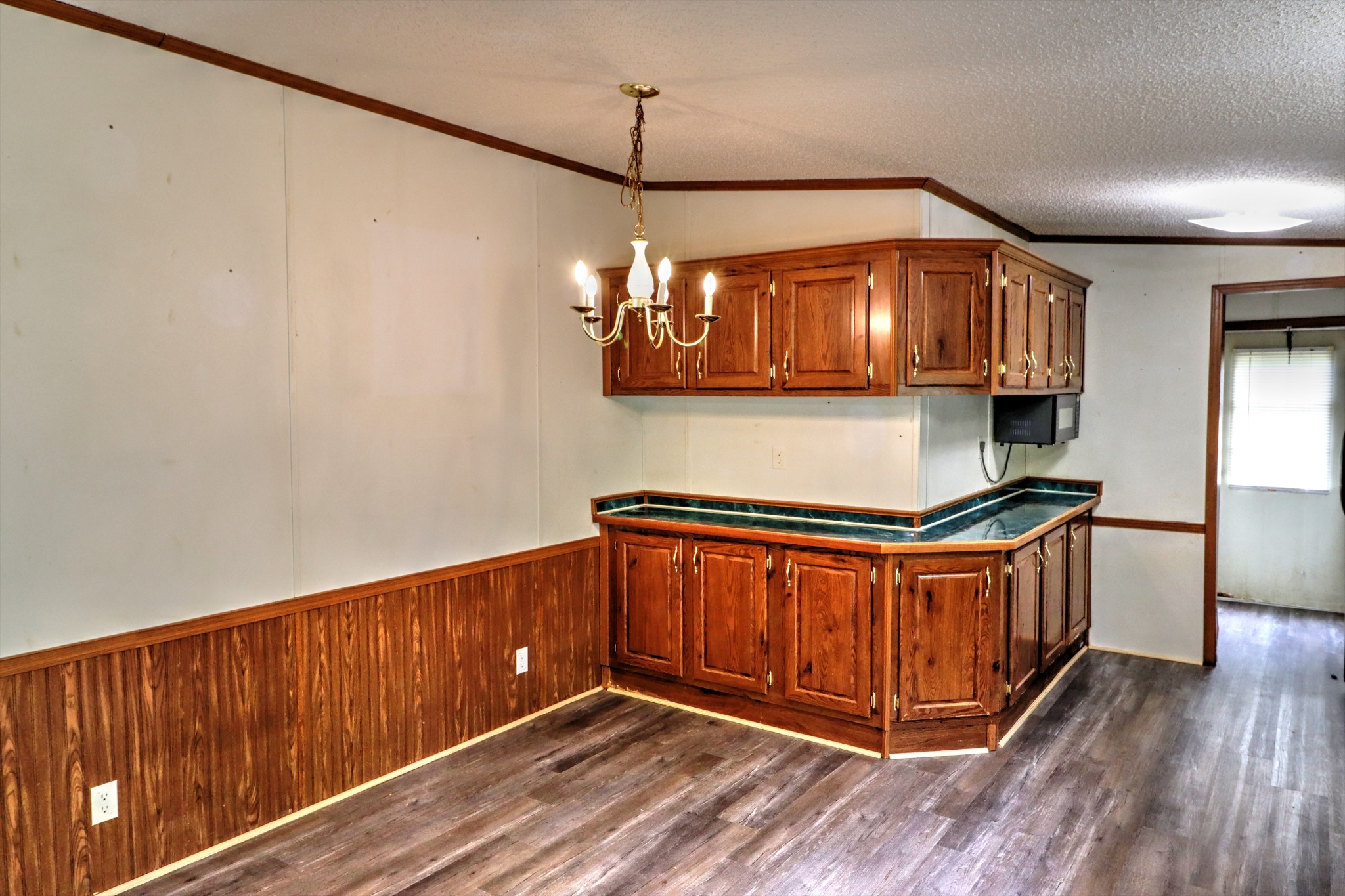 5090 Old Marion Road Cunningham, TN 37052 - Photo 10 of 21 a kitchen with stainless steel appliances granite countertop a stove a sink and a refrigerator