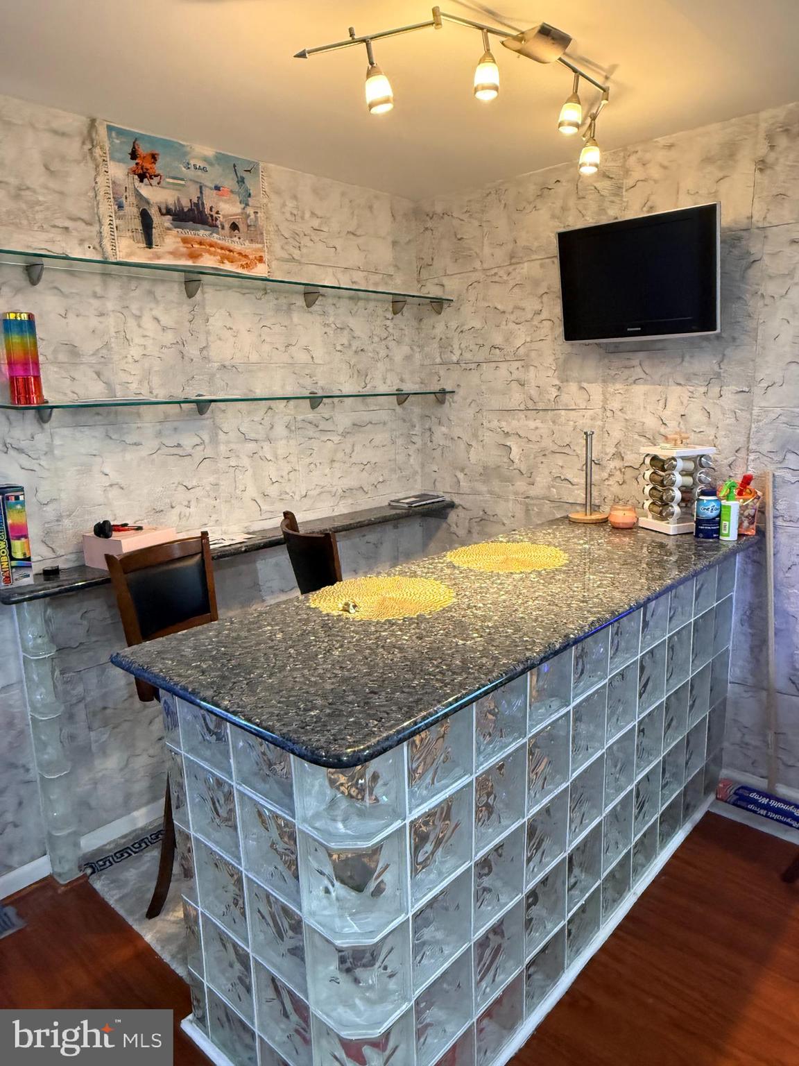 426 Parlin Street Philadelphia, PA 19116 - Photo 18 of 27 a bathroom with a granite countertop sink and a mirror