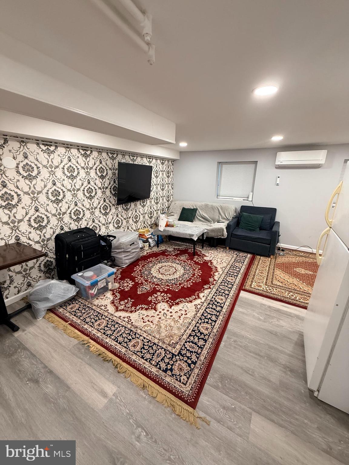 426 Parlin Street Philadelphia, PA 19116 - Photo 3 of 27 a living room with furniture and a flat screen tv