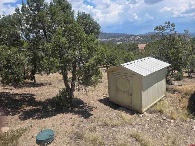 a view of a lake from a yard