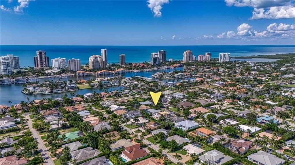 516 Neapolitan Lane Naples, FL 34103 - Photo 3 of 49 View of urban area with a large body of water