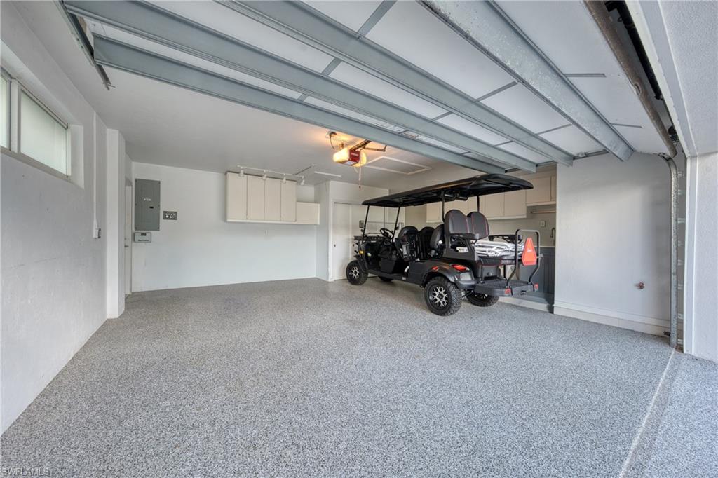 516 Neapolitan Lane Naples, FL 34103 - Photo 30 of 49 Garage with electric panel