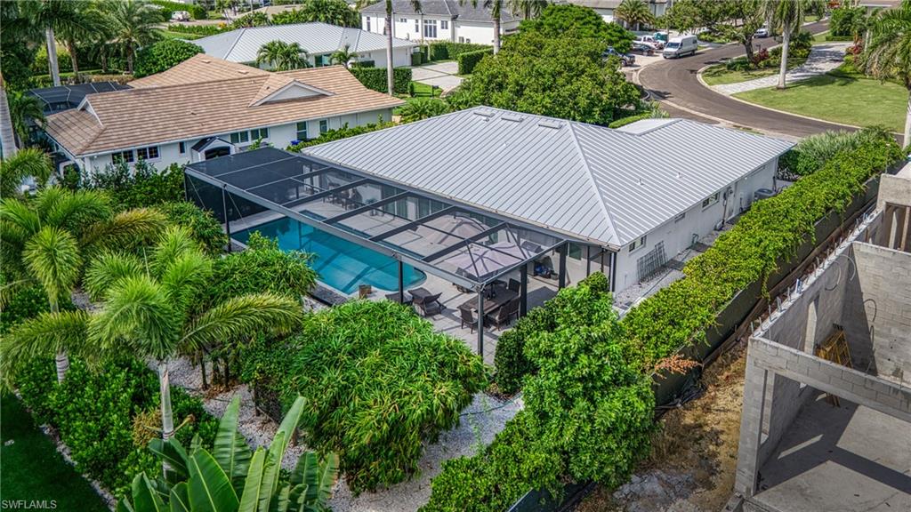 516 Neapolitan Lane Naples, FL 34103 - Photo 40 of 49 Drone / aerial view of a pool