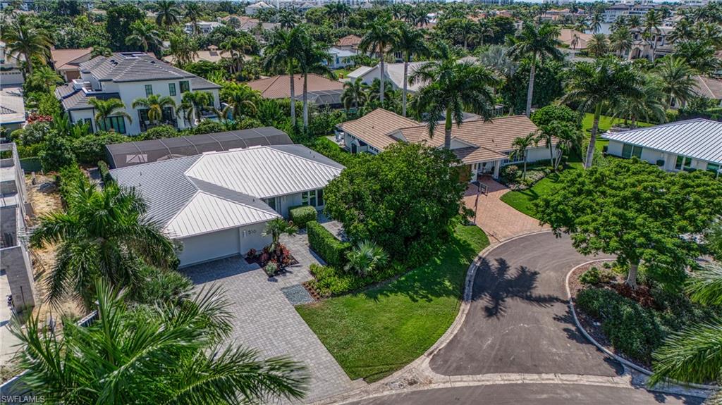 516 Neapolitan Lane Naples, FL 34103 - Photo 41 of 49 Aerial perspective of suburban area