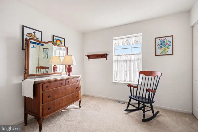 a room with furniture and window