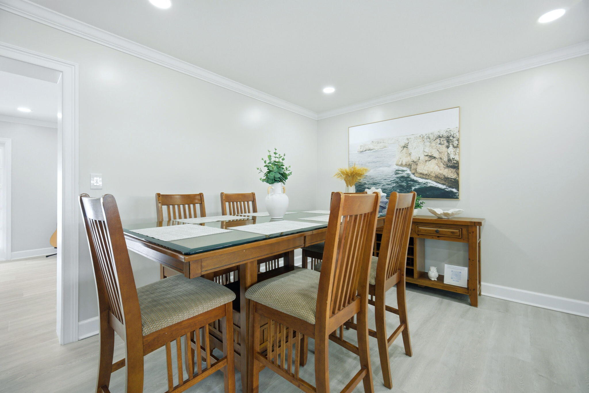 2740 Southeast 7th Street Pompano Beach, FL 33062 - Photo 14 of 34 a view of a dining room with furniture and wooden floor