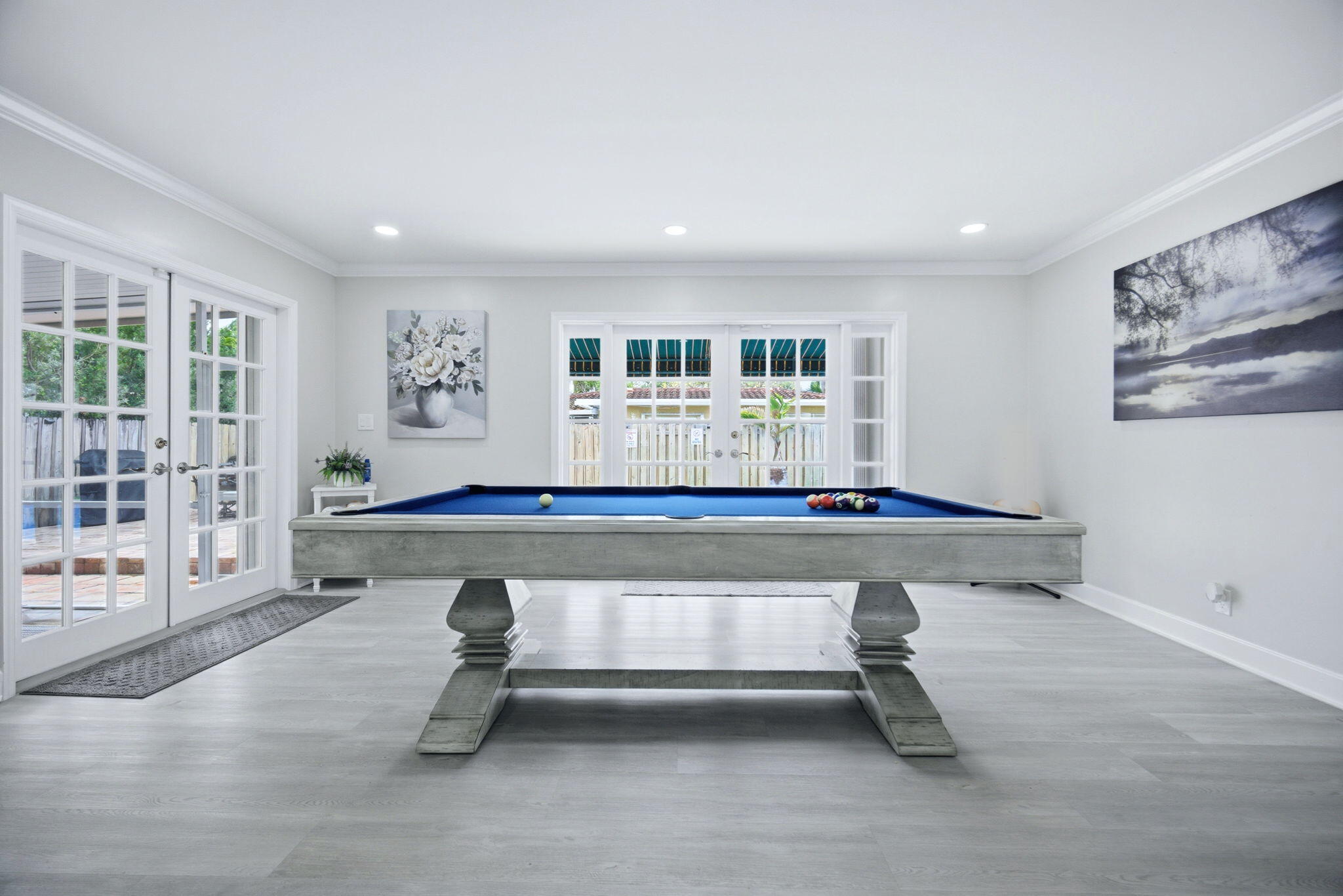 2740 Southeast 7th Street Pompano Beach, FL 33062 - Photo 15 of 34 a living room with furniture a rug and white walls