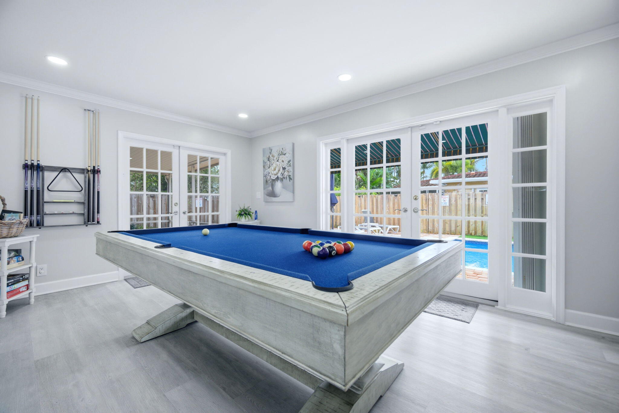 2740 Southeast 7th Street Pompano Beach, FL 33062 - Photo 16 of 34 a living room with furniture and floor to ceiling windows