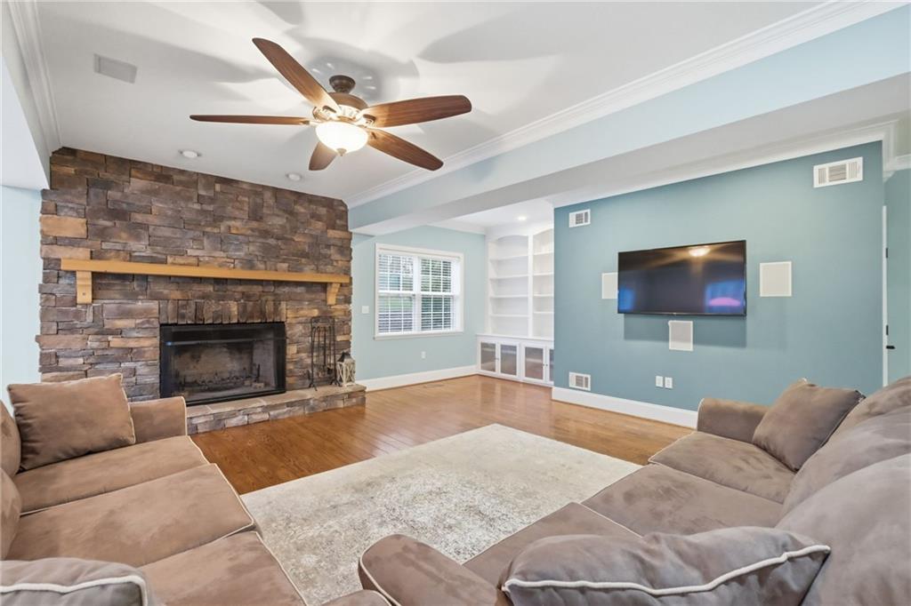 4021 Bakerstown Road Gibsonia, PA 15044 - Photo 16 of 43 a living room with furniture and a fireplace