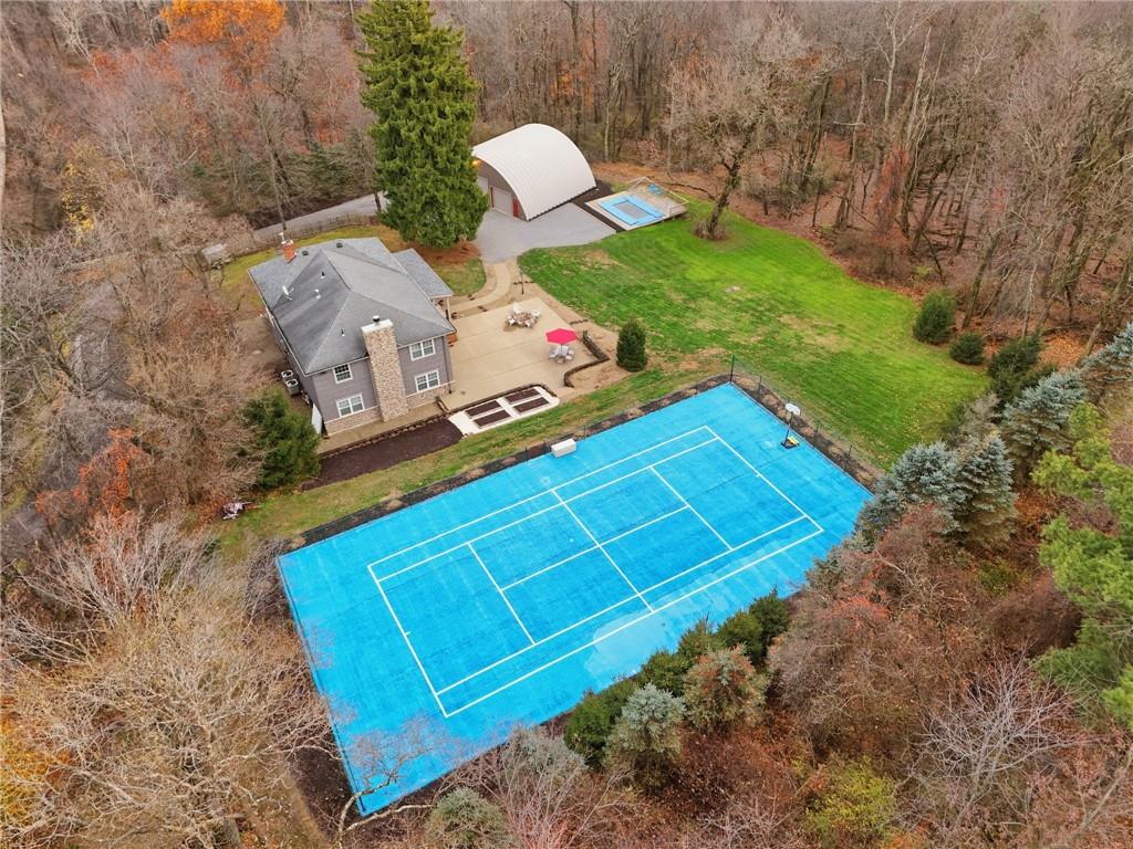 4021 Bakerstown Road Gibsonia, PA 15044 - Photo 2 of 43 a view of a backyard with chairs