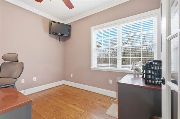 a workspace with furniture and a window