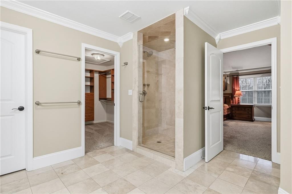 4021 Bakerstown Road Gibsonia, PA 15044 - Photo 29 of 43 a view of a bathroom with a glass door shower
