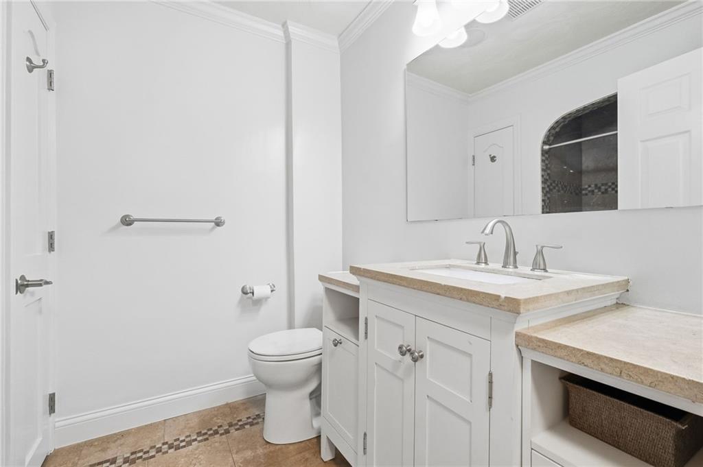 4021 Bakerstown Road Gibsonia, PA 15044 - Photo 33 of 43 a bathroom with a sink toilet and a mirror