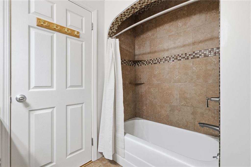 4021 Bakerstown Road Gibsonia, PA 15044 - Photo 34 of 43 a bathroom with a bathtub