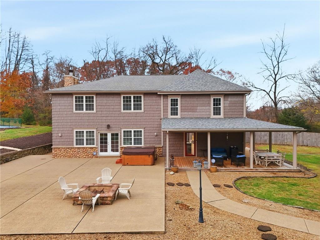 4021 Bakerstown Road Gibsonia, PA 15044 - Photo 40 of 43 a front view of a house with a yard table and chairs